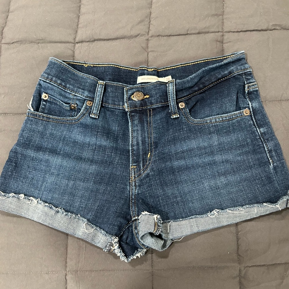 Levi's Mid Length Blue Denim Roll Cuff Shorts. Size W26